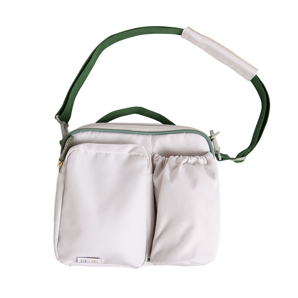 cream lunch bag with green accents