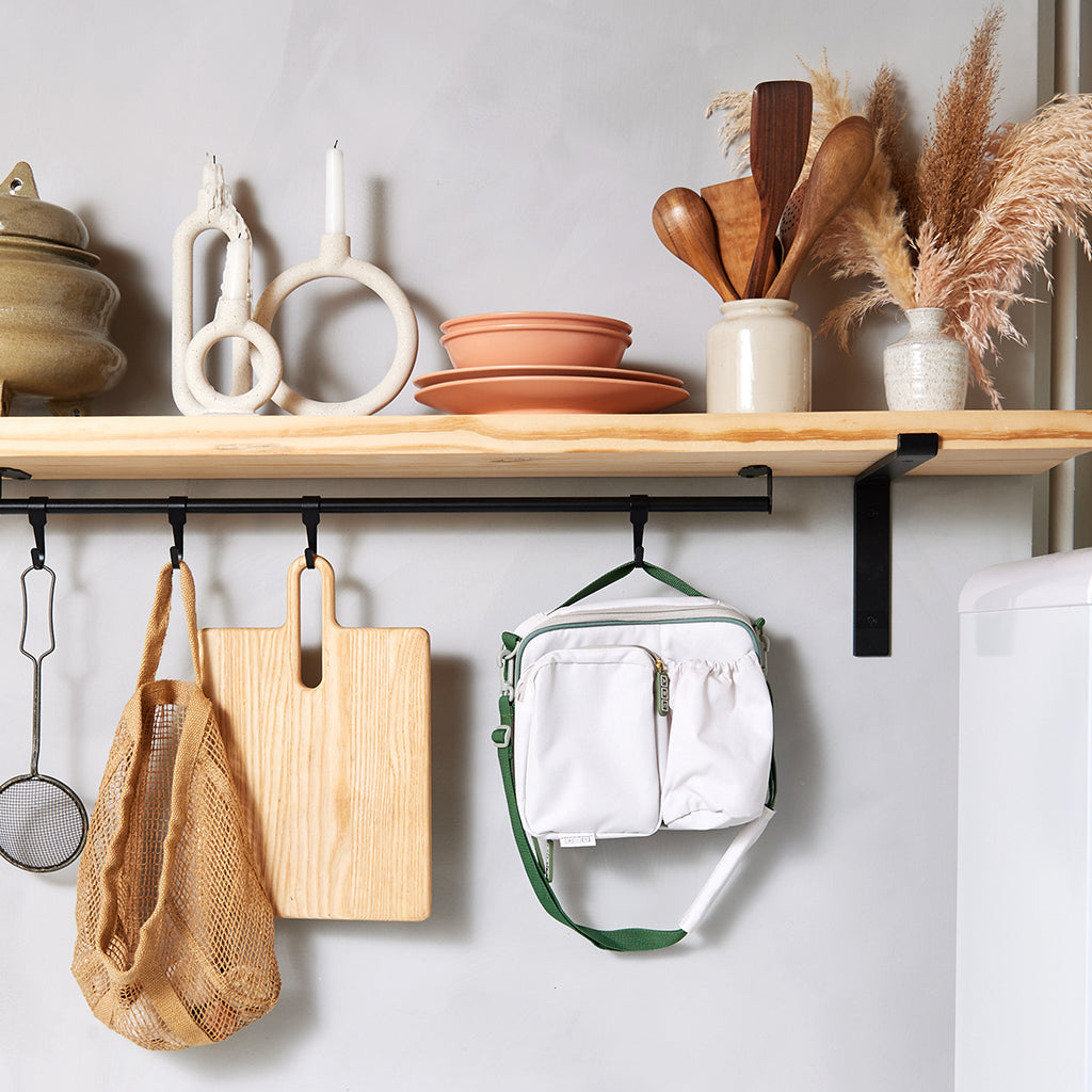 cream lunch bag with green accents