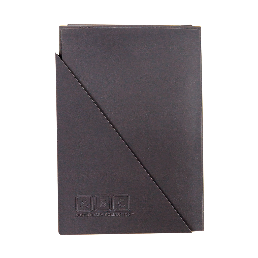 faded black silicone placemat, folded
