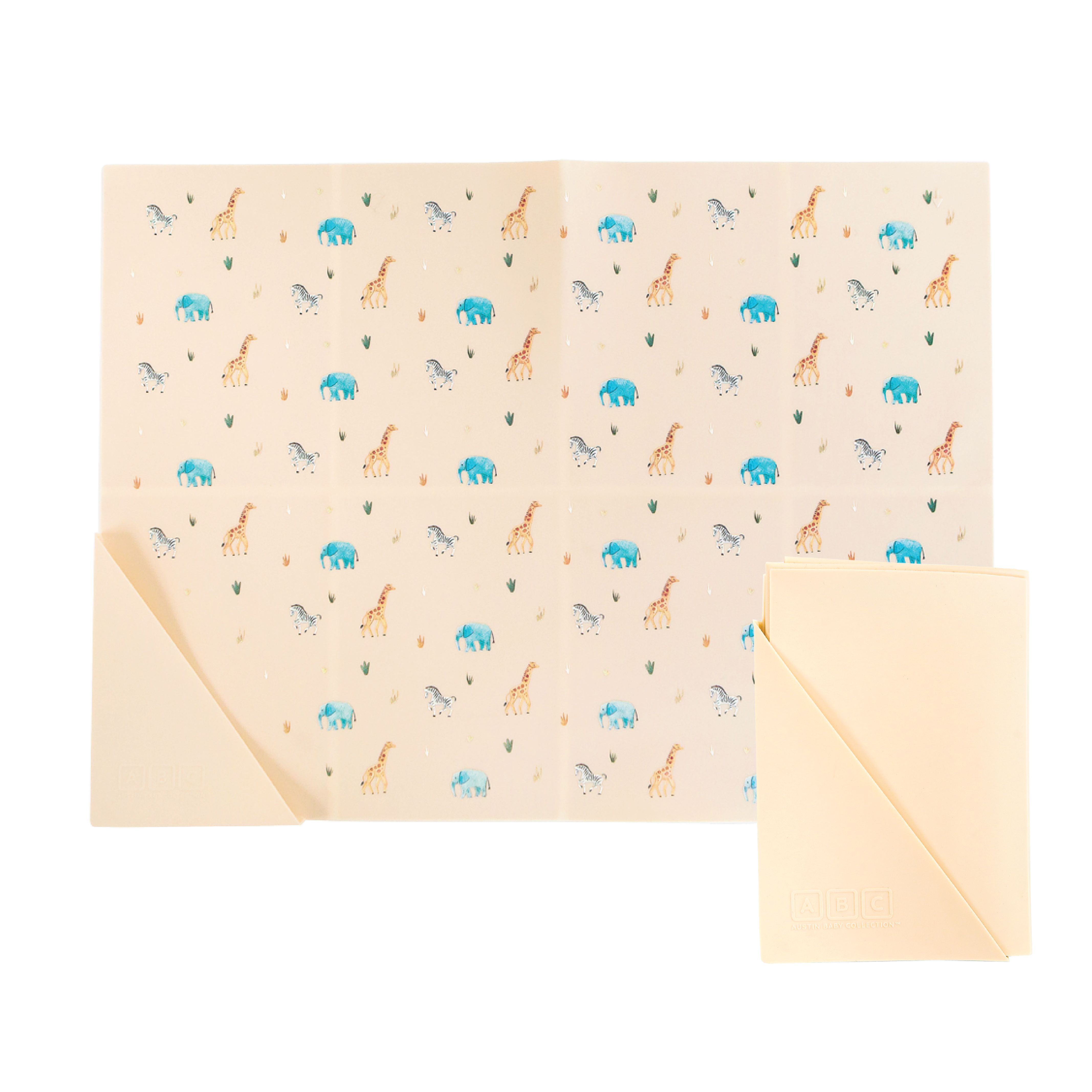 cream silicone placemat in safari animal print, shown folded and unfolded