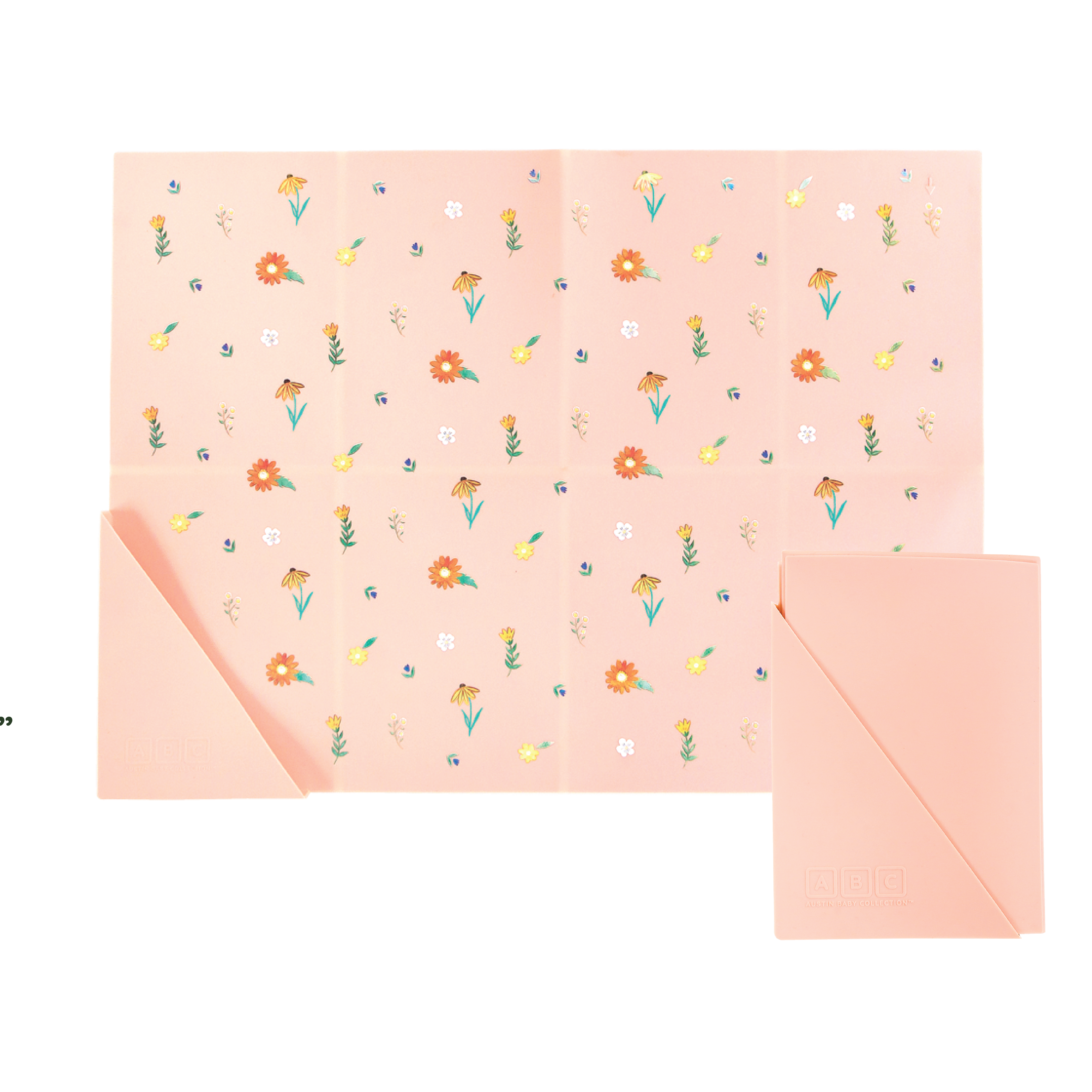 pink silicone placemat in wildflower print, shown folded and unfolded