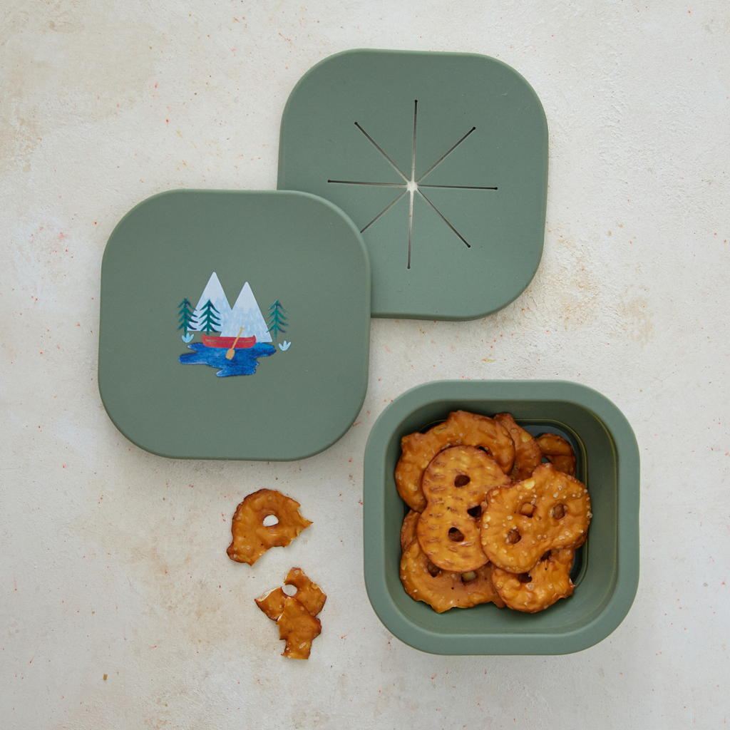 green snack bowl with two lids in camping print