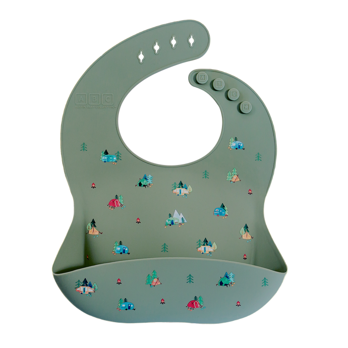 green silicone feeding bib with front pocket in camping print