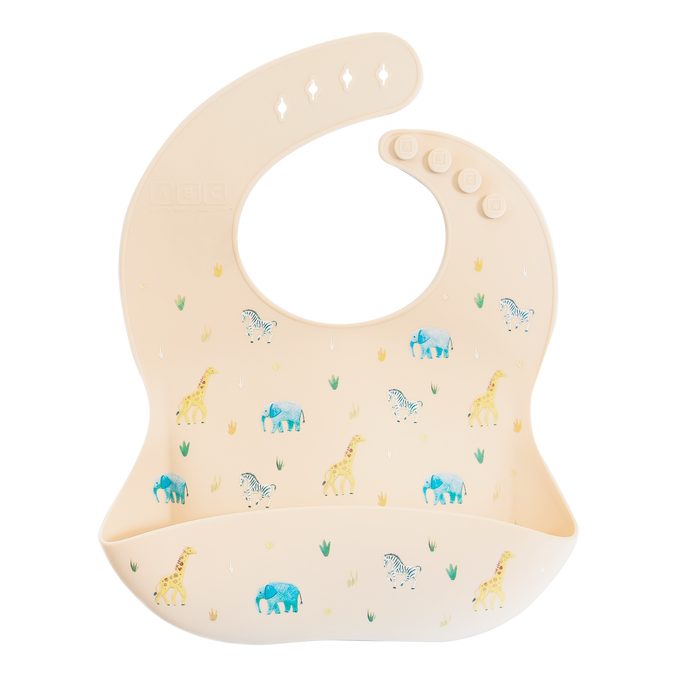 cream silicone feeding bib with front pocket in safari animal print