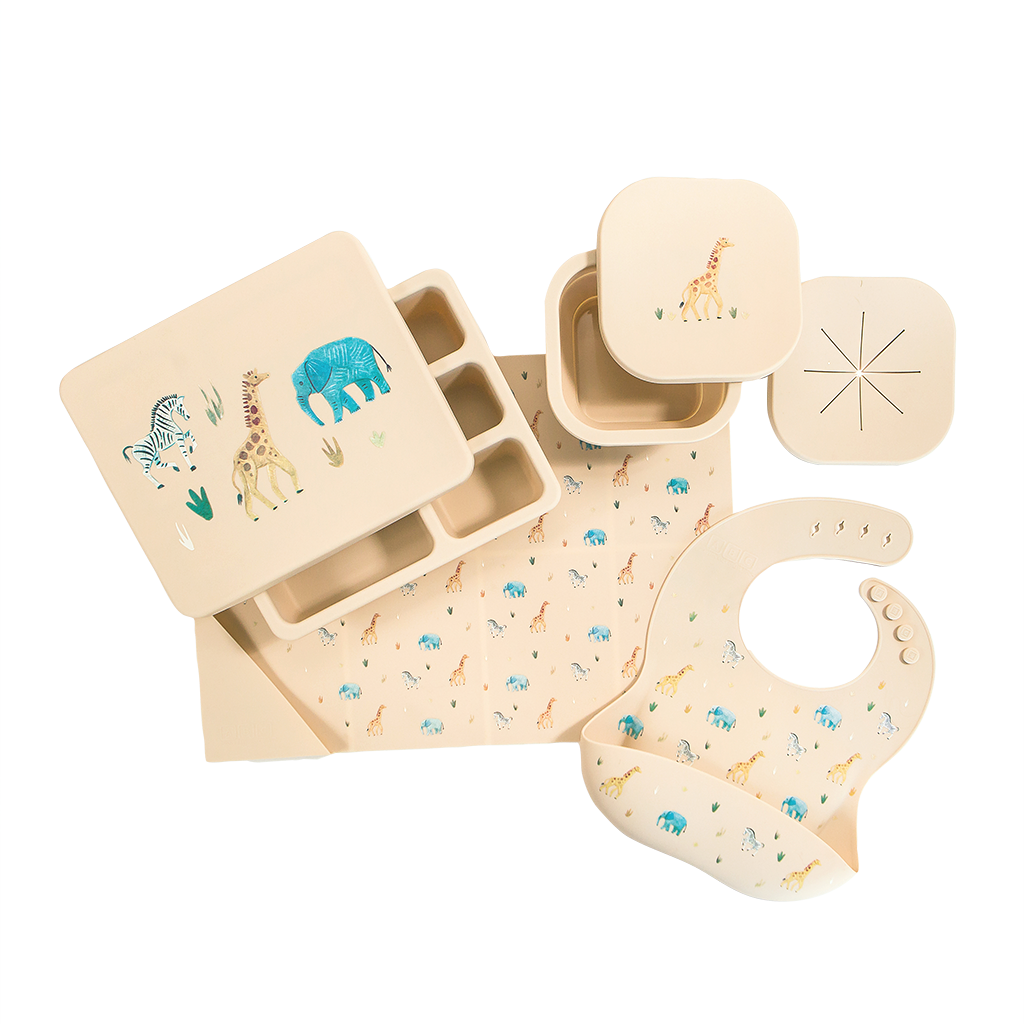 cream safari animal silicone gift set with lunch bento box, snack bowl, feeding bib, and placemat