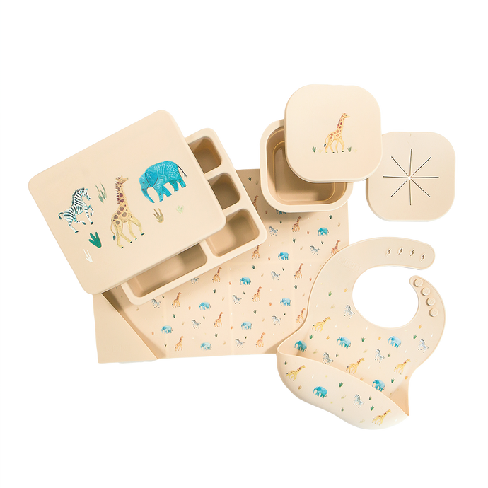 cream safari animal silicone gift set with lunch bento box, snack bowl, feeding bib, and placemat