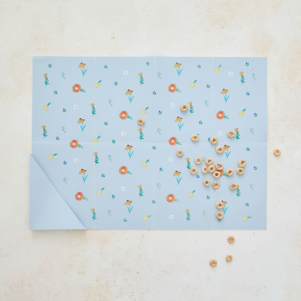 light blue silicone placemat in wildflower print